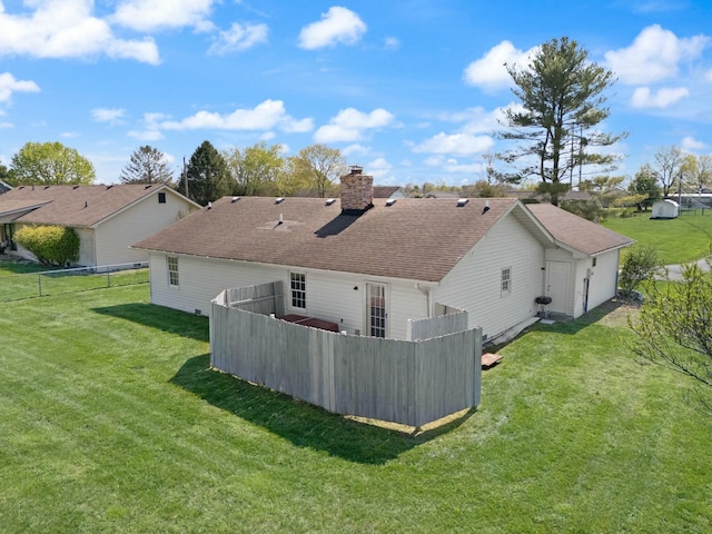 1124 Heartland Dr, Somerset, KY 42503 - rear view of house with roof with shingles, a yard, fence, and a chimney