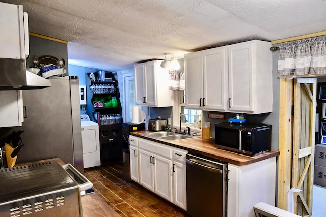 158 Halcomb E Rd, Orlando, KY 40460 - kitchen featuring washer / clothes dryer, appliances with stainless steel finishes, dark wood-style flooring, and white cabinets