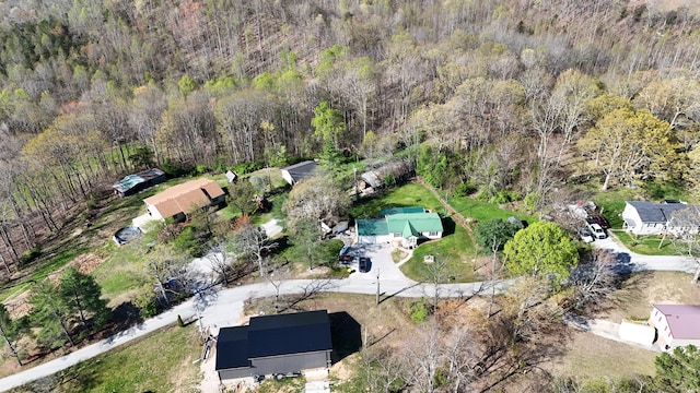 158 Halcomb E Rd, Orlando, KY 40460 - aerial view with a wooded view