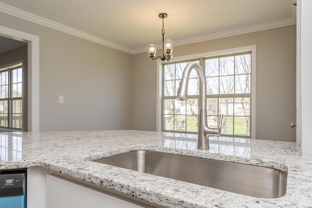 kitchen featuring a sink, a notable chandelier, crown molding, and dishwasher