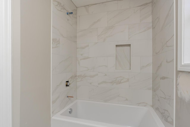 full bath featuring bathing tub / shower combination