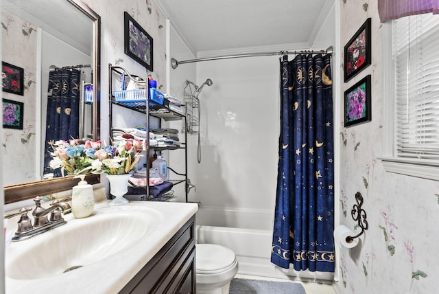 full bathroom featuring shower / bath combo with shower curtain, toilet, ornamental molding, and vanity