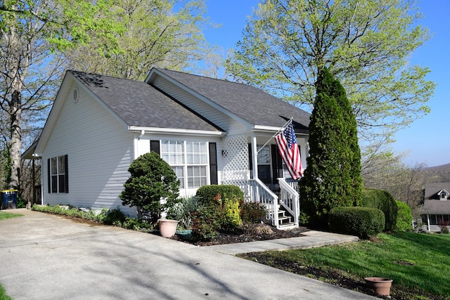 367 Old Rocky Rd, Mount Vernon, KY 40456 - view of front facade with roof with shingles and a front lawn