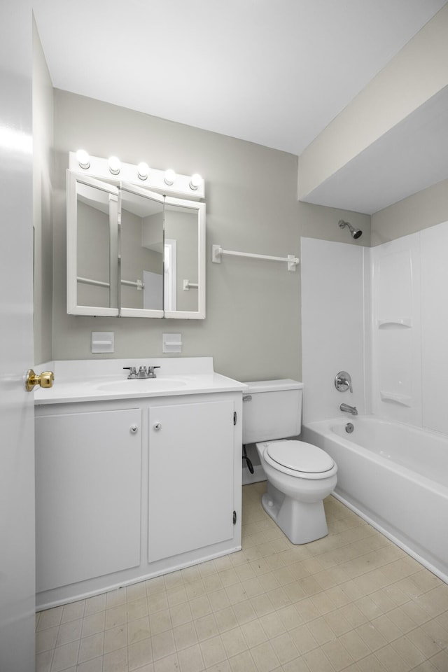 bathroom with toilet, shower / tub combination, and vanity