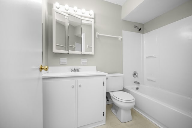 bathroom featuring vanity, shower / bathing tub combination, and toilet