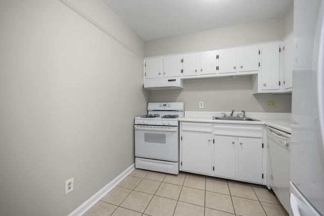 kitchen featuring light tile patterned floors, white appliances, white cabinets, under cabinet range hood, and a sink
