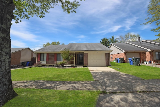 single story home with brick siding, a front lawn, a garage, and concrete driveway