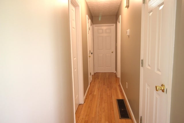 312 Springhurst Dr, Berea, KY 40403 - hall featuring light wood-style floors, baseboards, and visible vents
