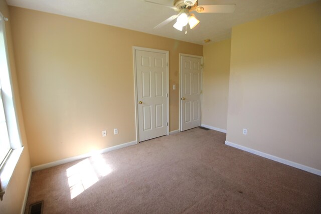 312 Springhurst Dr, Berea, KY 40403 - unfurnished bedroom with carpet flooring, baseboards, and visible vents