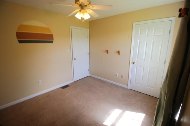 312 Springhurst Dr, Berea, KY 40403 - unfurnished bedroom with carpet floors, baseboards, and ceiling fan