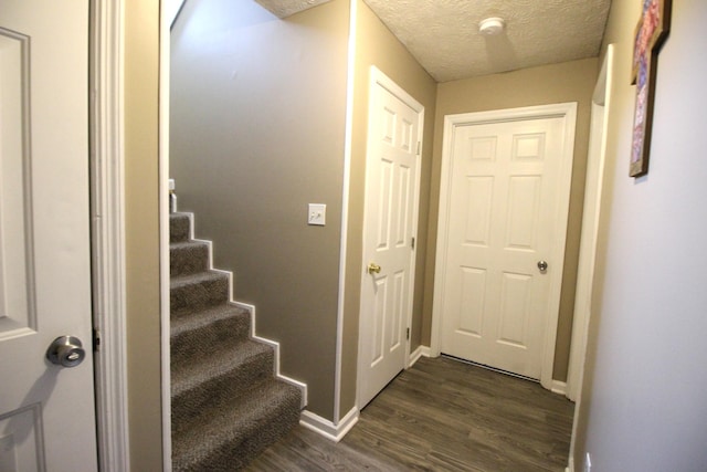 312 Springhurst Dr, Berea, KY 40403 - interior space with stairs, a textured ceiling, baseboards, and dark wood-type flooring