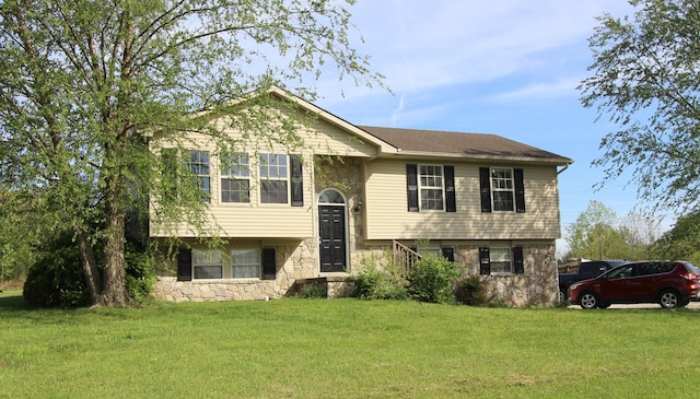 312 Springhurst Dr, Berea, KY 40403 - raised ranch with a front lawn and stone siding