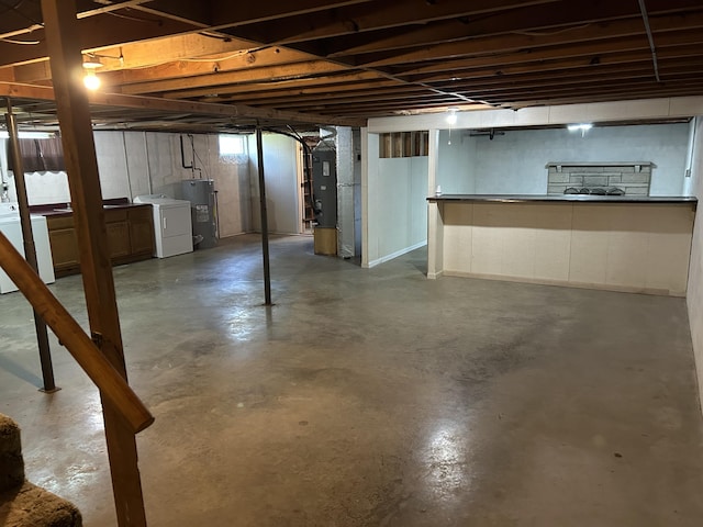 9380 Russell Springs Rd, Russell Springs, KY 42642 - below grade area featuring washer / clothes dryer, heating unit, and water heater