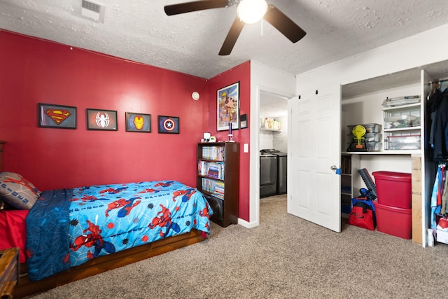 carpeted bedroom with a ceiling fan, a textured ceiling, and visible vents