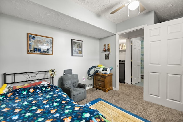 carpeted bedroom with baseboards, ceiling fan, and a textured ceiling