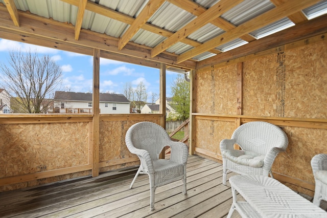 wooden terrace featuring a residential view