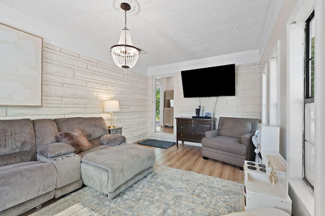 124 Clays Ferry Dr, Richmond, KY 40475 - living area featuring a textured ceiling, a notable chandelier, and wood finished floors
