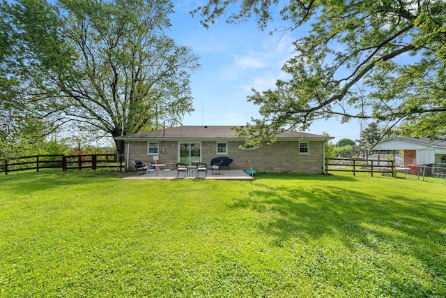 124 Clays Ferry Dr, Richmond, KY 40475 - rear view of property with a fenced backyard, a patio area, stone siding, and a lawn