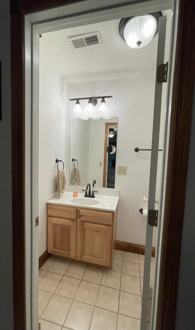 1459 Buck Lick Rd, Tollesboro, KY 41189 - bathroom with vanity, tile patterned floors, and a textured ceiling