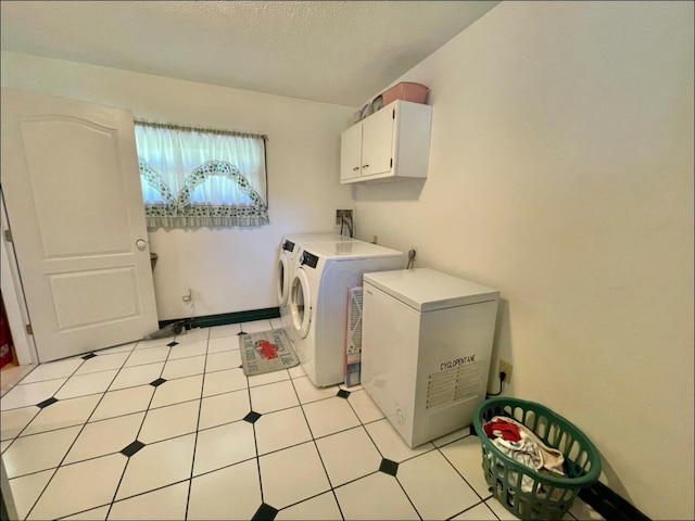 1459 Buck Lick Rd, Tollesboro, KY 41189 - laundry room with cabinet space, washer and dryer, a textured ceiling, and light tile patterned floors