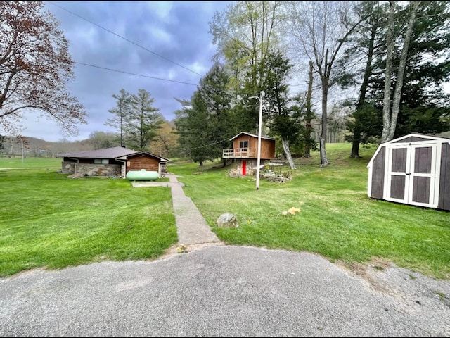 1459 Buck Lick Rd, Tollesboro, KY 41189 - view of green lawn with a shed
