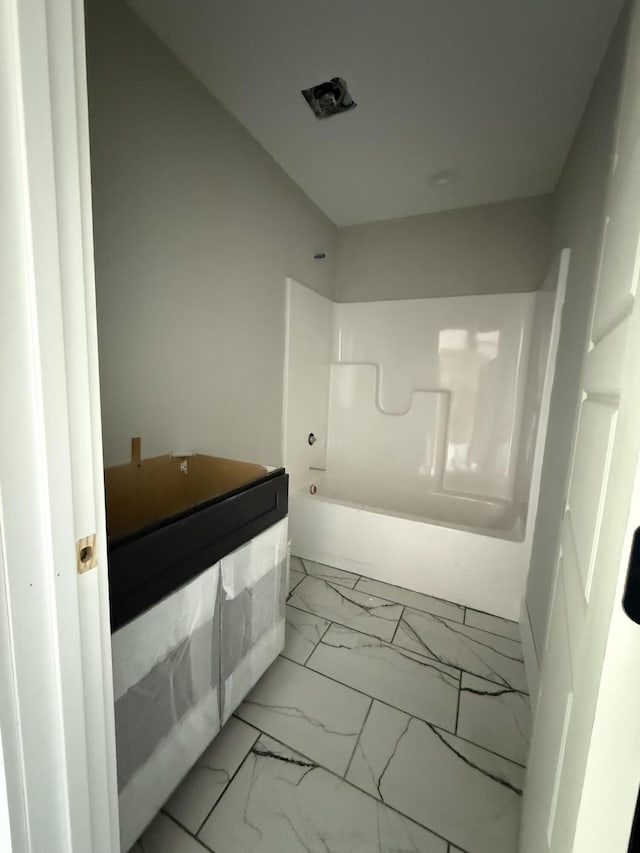 860 Denali Dr, Richmond, KY 40475 - bathroom featuring tub / shower combination and marble finish floor