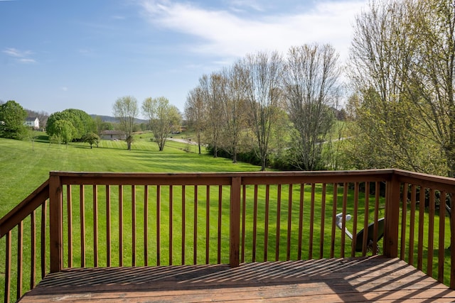 deck featuring a lawn