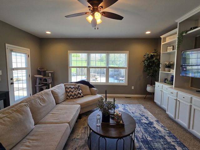 1778 Elkin Station Rd, Winchester, KY 40391 - living area with dark colored carpet, a ceiling fan, baseboards, and recessed lighting