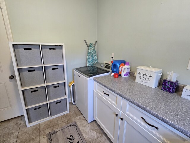 1778 Elkin Station Rd, Winchester, KY 40391 - laundry room featuring washer and dryer and cabinet space