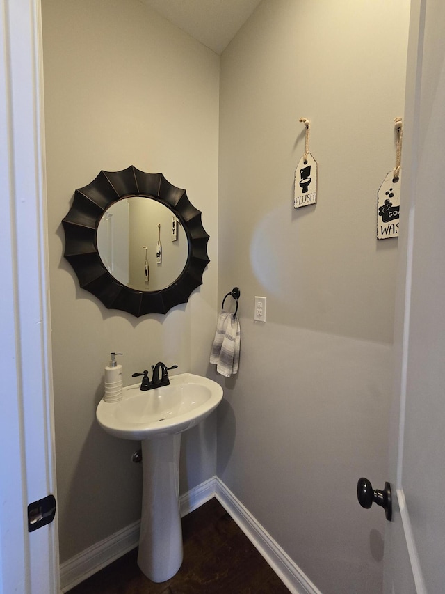 1778 Elkin Station Rd, Winchester, KY 40391 - bathroom featuring wood finished floors and baseboards