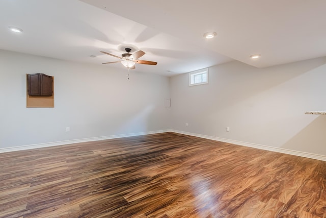 unfurnished room with baseboards, recessed lighting, wood finished floors, and a ceiling fan