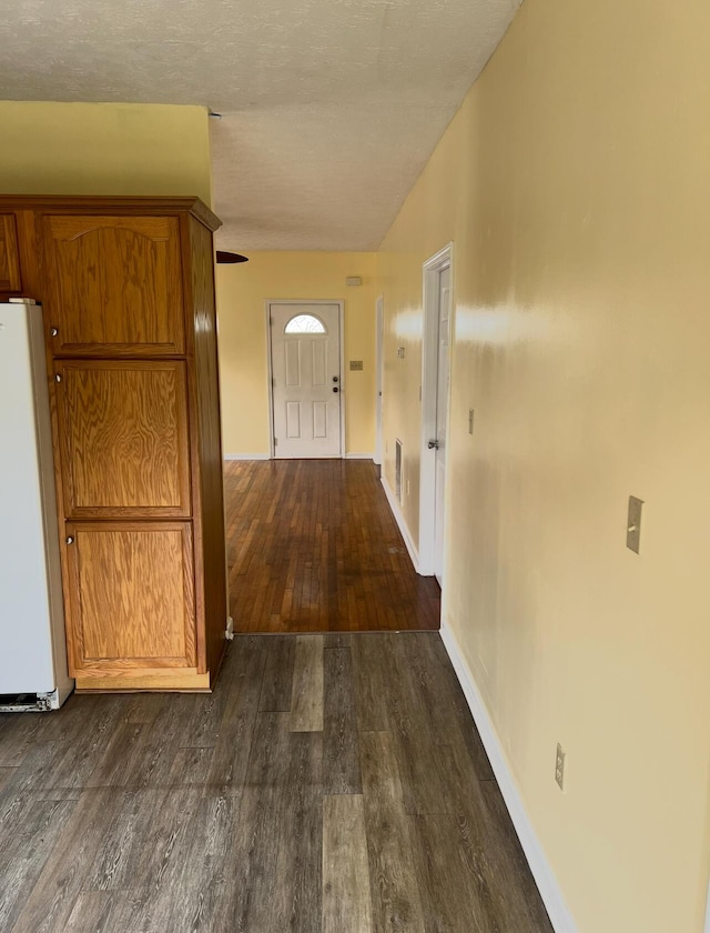 115 Georgia St, Winchester, KY 40391 - hall with dark wood-type flooring and baseboards