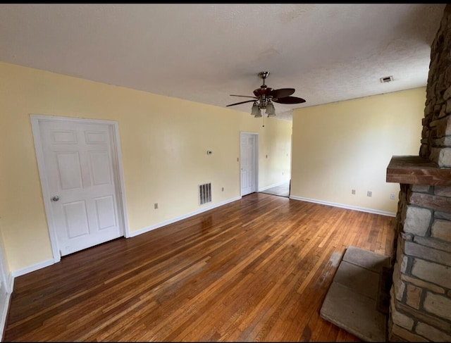 115 Georgia St, Winchester, KY 40391 - unfurnished living room featuring ceiling fan, baseboards, visible vents, and hardwood / wood-style flooring