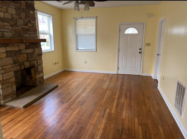 115 Georgia St, Winchester, KY 40391 - unfurnished living room featuring ceiling fan, baseboards, visible vents, and hardwood / wood-style flooring