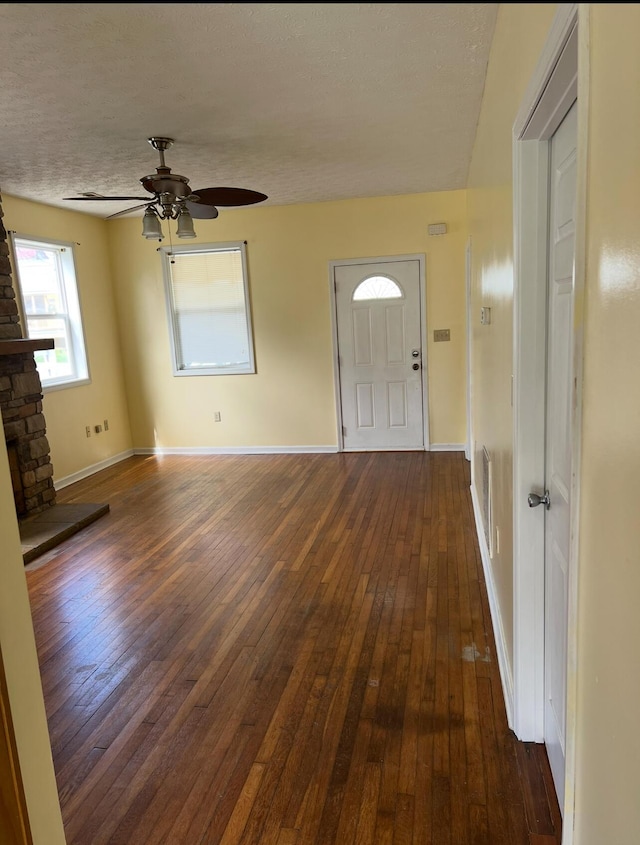 115 Georgia St, Winchester, KY 40391 - entrance foyer featuring a ceiling fan, a textured ceiling, baseboards, and dark wood finished floors