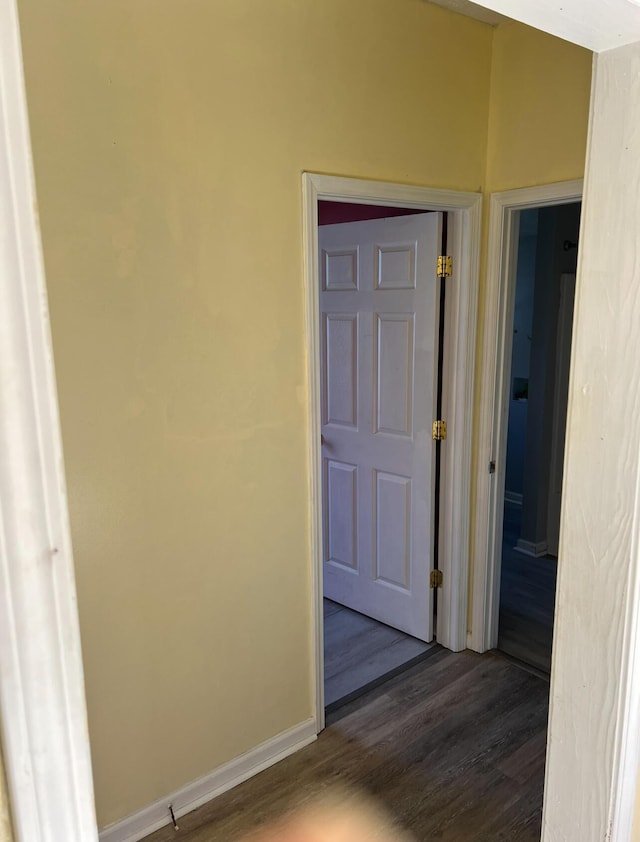 115 Georgia St, Winchester, KY 40391 - corridor with dark wood-style flooring and baseboards