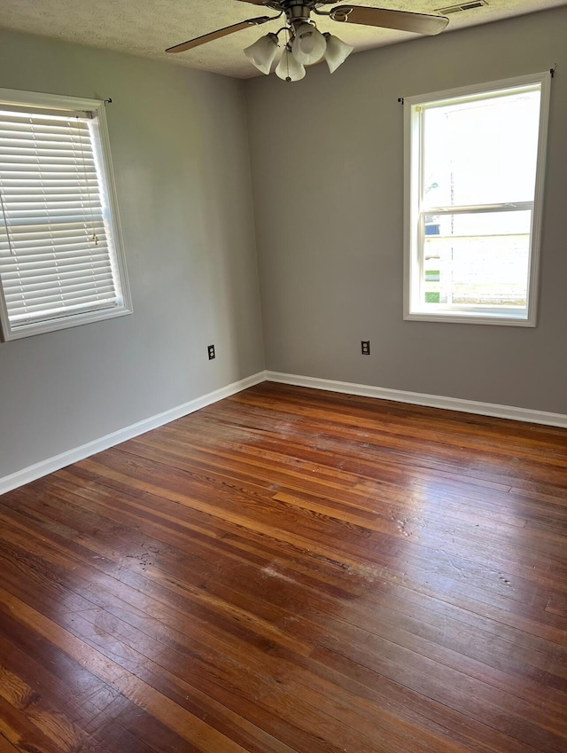 115 Georgia St, Winchester, KY 40391 - spare room with dark wood-style floors, baseboards, and a ceiling fan