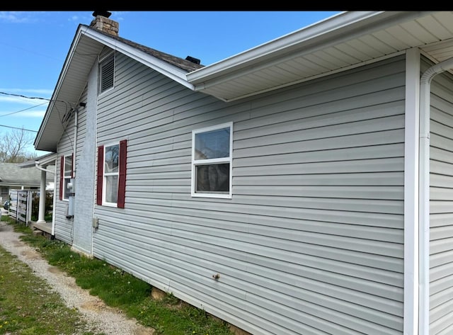 115 Georgia St, Winchester, KY 40391 - view of property exterior featuring a chimney