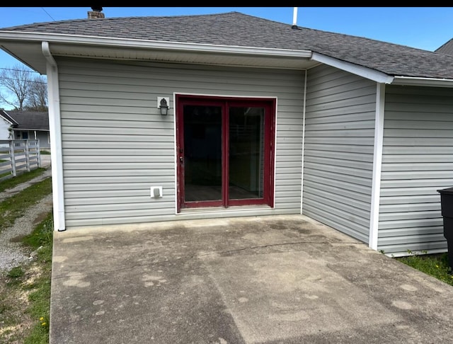 115 Georgia St, Winchester, KY 40391 - rear view of property featuring fence, a patio, and a shingled roof