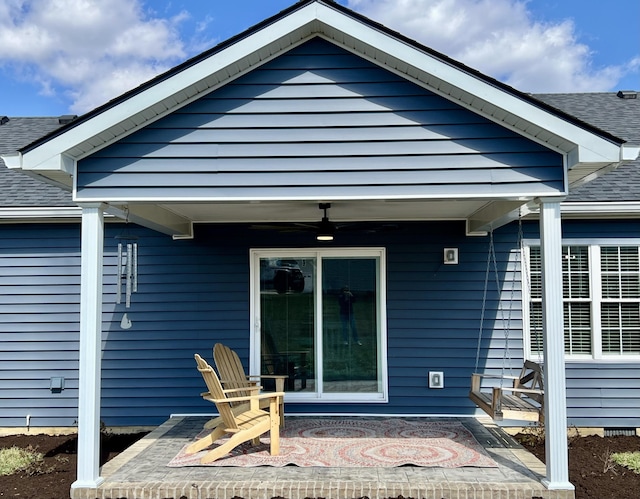 108 Allyson Cir, Junction City, KY 40440 - back of property featuring a ceiling fan, a patio, and a shingled roof