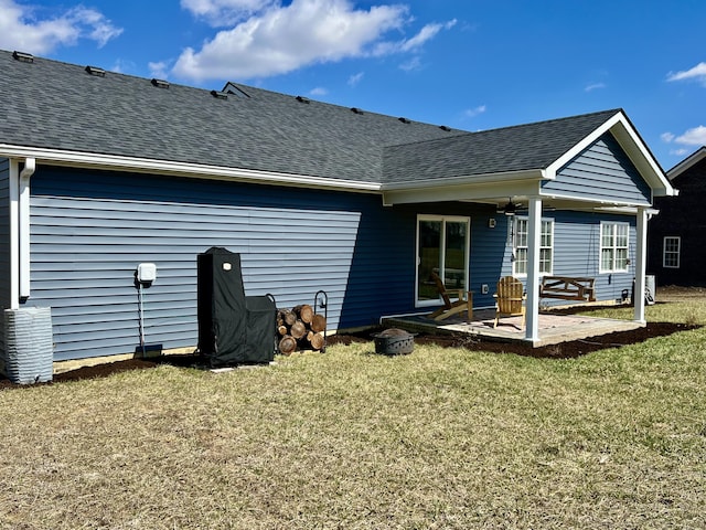 108 Allyson Cir, Junction City, KY 40440 - back of property featuring a patio, a yard, and roof with shingles