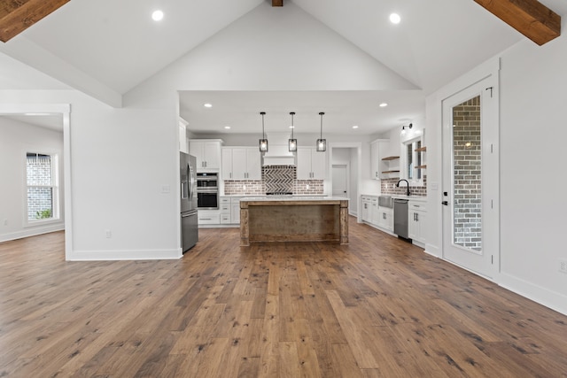 215 Berkley Hall Dr, Berea, KY 40403 - kitchen with stainless steel appliances, light countertops, tasteful backsplash, white cabinetry, and recessed lighting