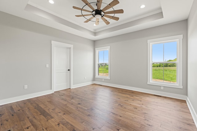 215 Berkley Hall Dr, Berea, KY 40403 - unfurnished room featuring a tray ceiling, crown molding, a ceiling fan, hardwood / wood-style floors, and baseboards