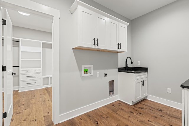 215 Berkley Hall Dr, Berea, KY 40403 - laundry area featuring hookup for an electric dryer, hookup for a washing machine, light wood-type flooring, and baseboards