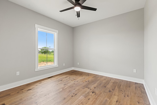 215 Berkley Hall Dr, Berea, KY 40403 - spare room with a ceiling fan, hardwood / wood-style flooring, and baseboards