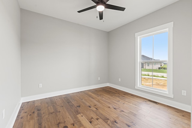 215 Berkley Hall Dr, Berea, KY 40403 - spare room featuring a ceiling fan, hardwood / wood-style flooring, and baseboards