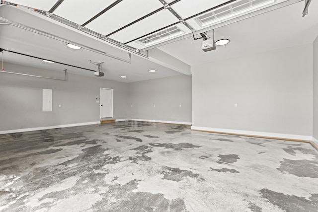 215 Berkley Hall Dr, Berea, KY 40403 - garage with a garage door opener and baseboards
