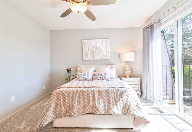 bedroom with access to exterior, carpet flooring, baseboards, and a ceiling fan