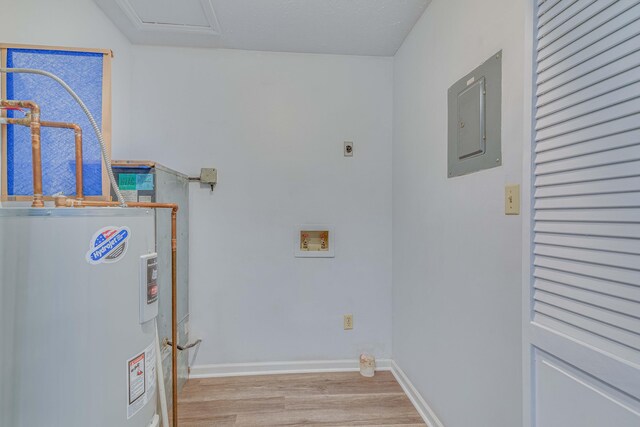 laundry room with electric water heater, hookup for an electric dryer, electric panel, laundry area, and hookup for a washing machine