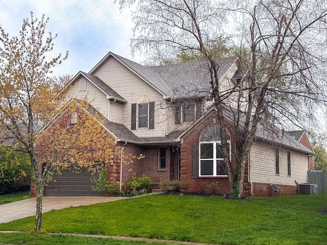 traditional-style house with brick siding, driveway, central air condition unit, and a front yard